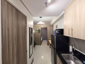 1BR Condotel with Balcony at FAME Residences #FM38