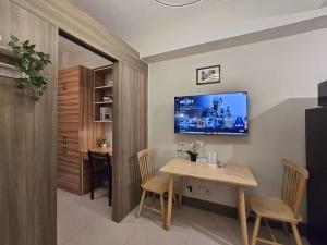 1BR Condotel with Balcony at FAME Residences #FM38