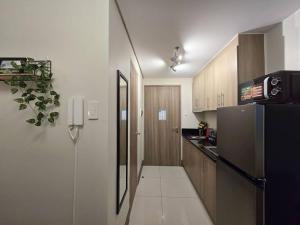 1BR Condotel with Balcony at FAME Residences #FM39