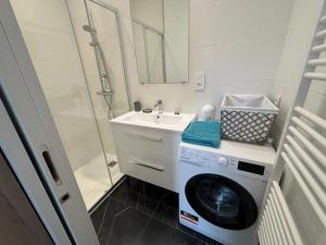 Appartements Au Coeur du Marche, Appartement Confort, Centre-ville : photos des chambres