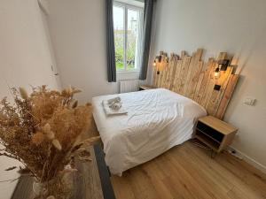 Appartements Au Coeur du Marche, Appartement Confort, Centre-ville : photos des chambres