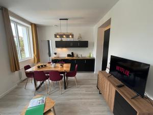 Appartements Au Coeur du Marche, Appartement Confort, Centre-ville : photos des chambres