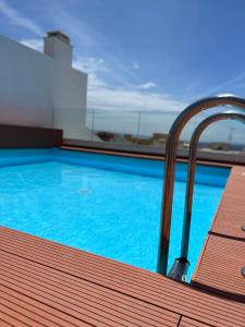 Zona centrica pero tranquila con piscina y fibra