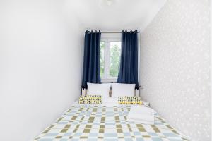 Olsza Comfy Apartment by BookingHost