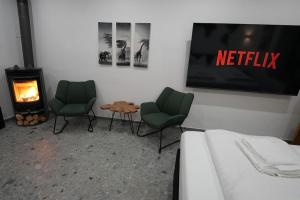 Suite mit Badewanne, Kamin und Parkplatz