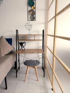 Appartements Studio lumineux 3 min Gare Houilles - RER A, Ligne L et J : photos des chambres