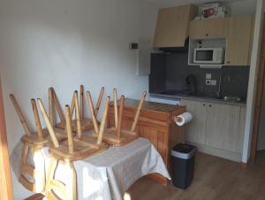 Appartements Charmant studio vu sur la montagne : photos des chambres