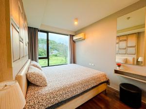 Comfy 1 Bedroom Condo in Surin (Seaview Rooftop Pool & Gym)