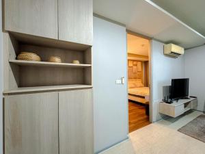 Comfy 1 Bedroom Condo in Surin (Seaview Rooftop Pool & Gym)