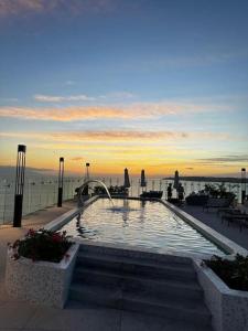 Rooftop, pool y amenidades