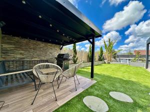 Maisons de vacances L Oasis : photos des chambres