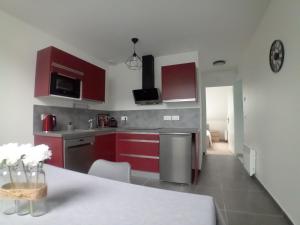 Appartements T2 NEUF DANS MAISON RENOVEE : photos des chambres