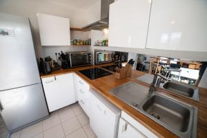 Appartements Village Olympique - Lumineux Dupleix : photos des chambres