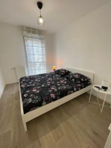 Appartements Appartement cosy proche Paris : photos des chambres
