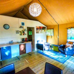 Luxury Safari Tent with Hot Tub at Camping La Fortinerie