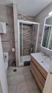 Blue Oasis Sea and Mountain Panorama