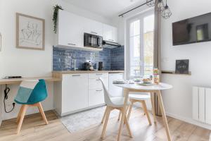 Appartements Studio Cosy face gare RER A : photos des chambres