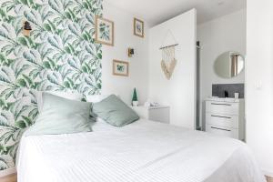 Appartements Studio Cosy face gare RER A : photos des chambres
