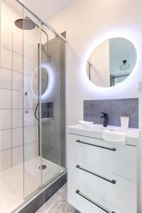 Appartements Studio Cosy face gare RER A : photos des chambres