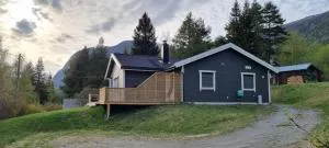Hus i flott natur. - Dovre