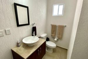 Preciosa casa nueva con 3 recámaras y 3 baños a 7 min del Tren Maya