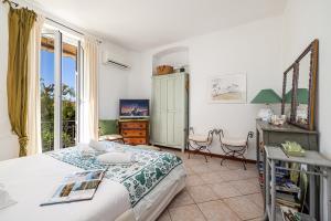 Appartements Les Orangers - Happy Rentals : photos des chambres