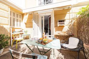 Appartements Les Orangers - Happy Rentals : photos des chambres