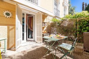 Appartements Les Orangers - Happy Rentals : photos des chambres