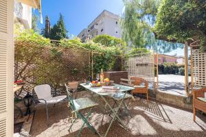 Appartements Les Orangers - Happy Rentals : photos des chambres