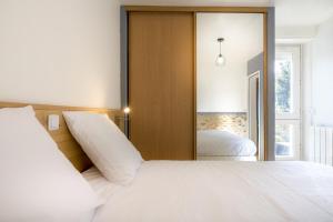 Appartements Le Nid Douillet ~ Confort ~ Parking ~ Terrasse : photos des chambres