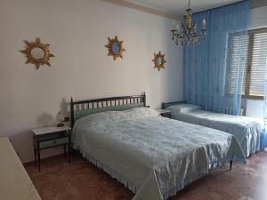 Chambre Triple avec Balcon