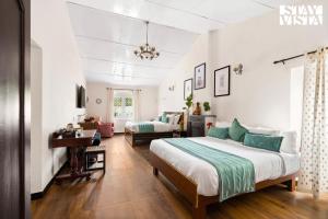 StayVista at The Alcove with Breakfast & BBQ Grill