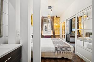 Appartements La Suite Indivio - Appartement standing vue cathedrale : photos des chambres