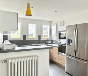 Maisons de vacances Superbe maison proche Paris : photos des chambres