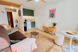 Appartements Studio Bord de lac avec terrasse classe 2 etoiles : photos des chambres