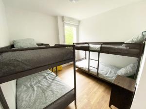 Appartements Apt Val d-Europe - 10 min de Disney - Parking : photos des chambres