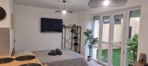 Appartements 2-Appartement RDC avec jardin : photos des chambres