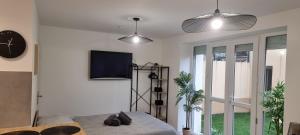 Appartements 2-Appartement RDC avec jardin : photos des chambres