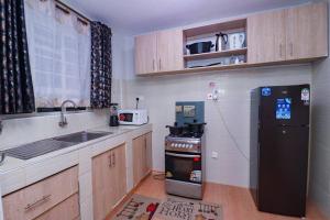 Urban Oasis Stylish 2BR EnSuite in Nairobi,TRM dr