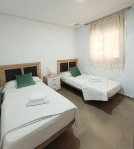 Mar y Sal 12 Suites, gran terraza con vistas al mar, 2 Hab, garaje y piscina