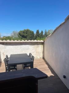 Maisons de vacances Maison de ville avec terrasse. : photos des chambres