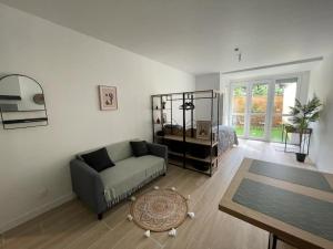 Appartements 3-Appartement RDC avec jardin : photos des chambres
