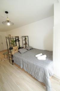 Appartements 3-Appartement RDC avec jardin : photos des chambres