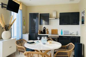 Appartements L-Escapade marine appartement avec jacuzzi prive : photos des chambres