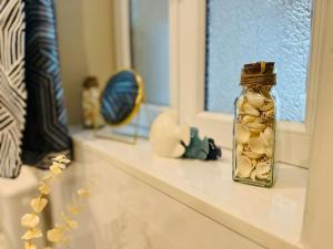 Appartements L-Escapade marine appartement avec jacuzzi prive : photos des chambres