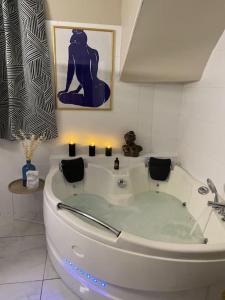 Appartements L-Escapade marine appartement avec jacuzzi prive : photos des chambres