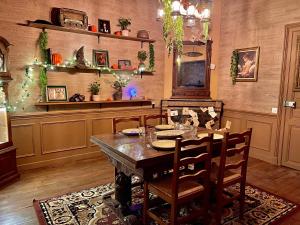 Appartements Repaire du sorcier, escape game, nuit atypique : photos des chambres