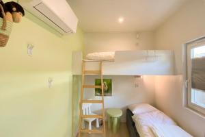 Ralreiger Chaletlodge met airco, tuin op het zuiden en fietsenberging