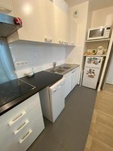 Grande chambre avec cuisine privée