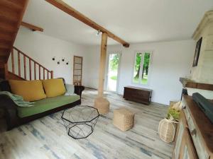 Maisons de vacances Maison charmante avec jardin : photos des chambres